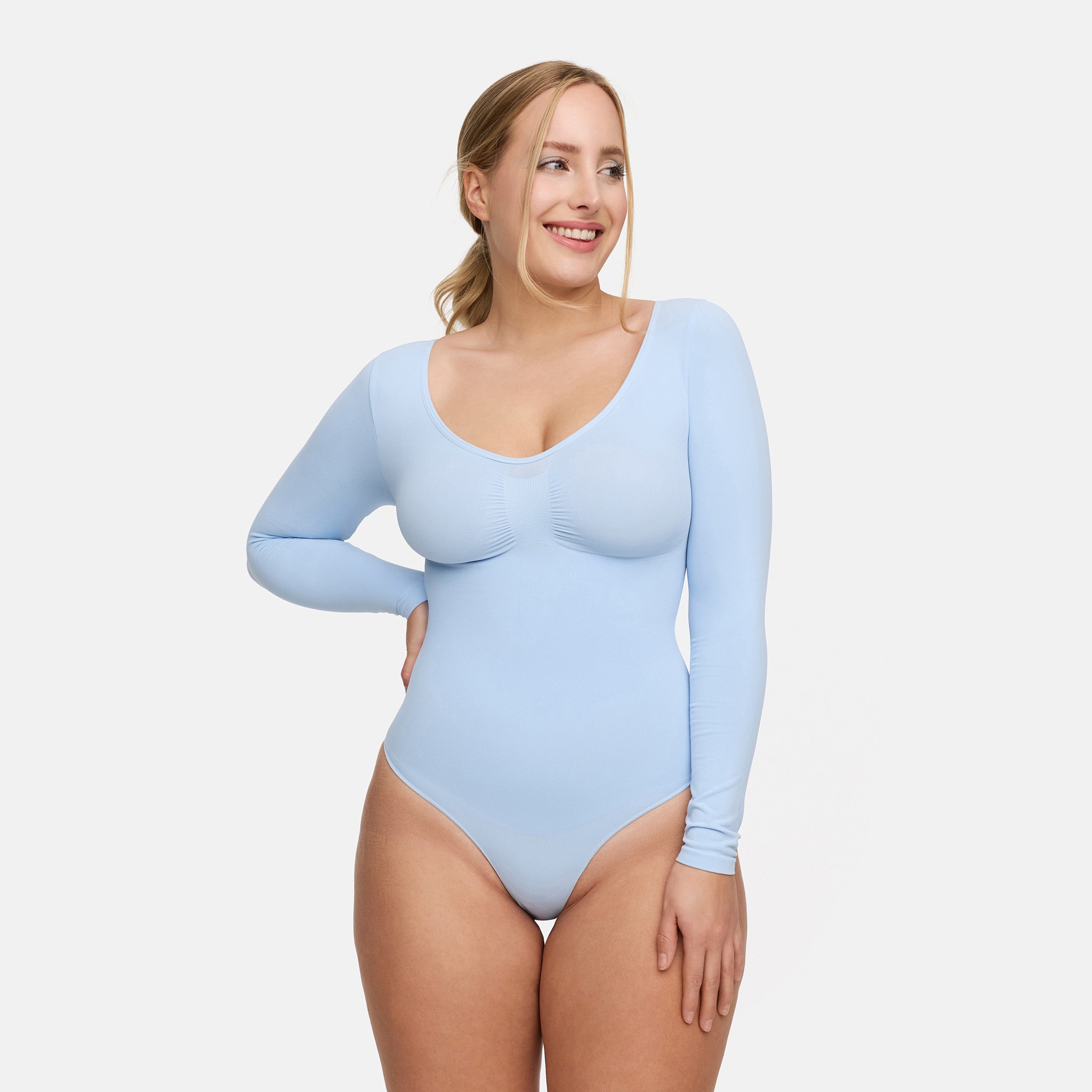 <tc>Body modellante a maniche lunghe con slip</tc>