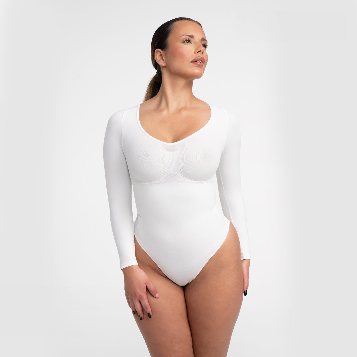 <tc>Body modellante a maniche lunghe con slip</tc>