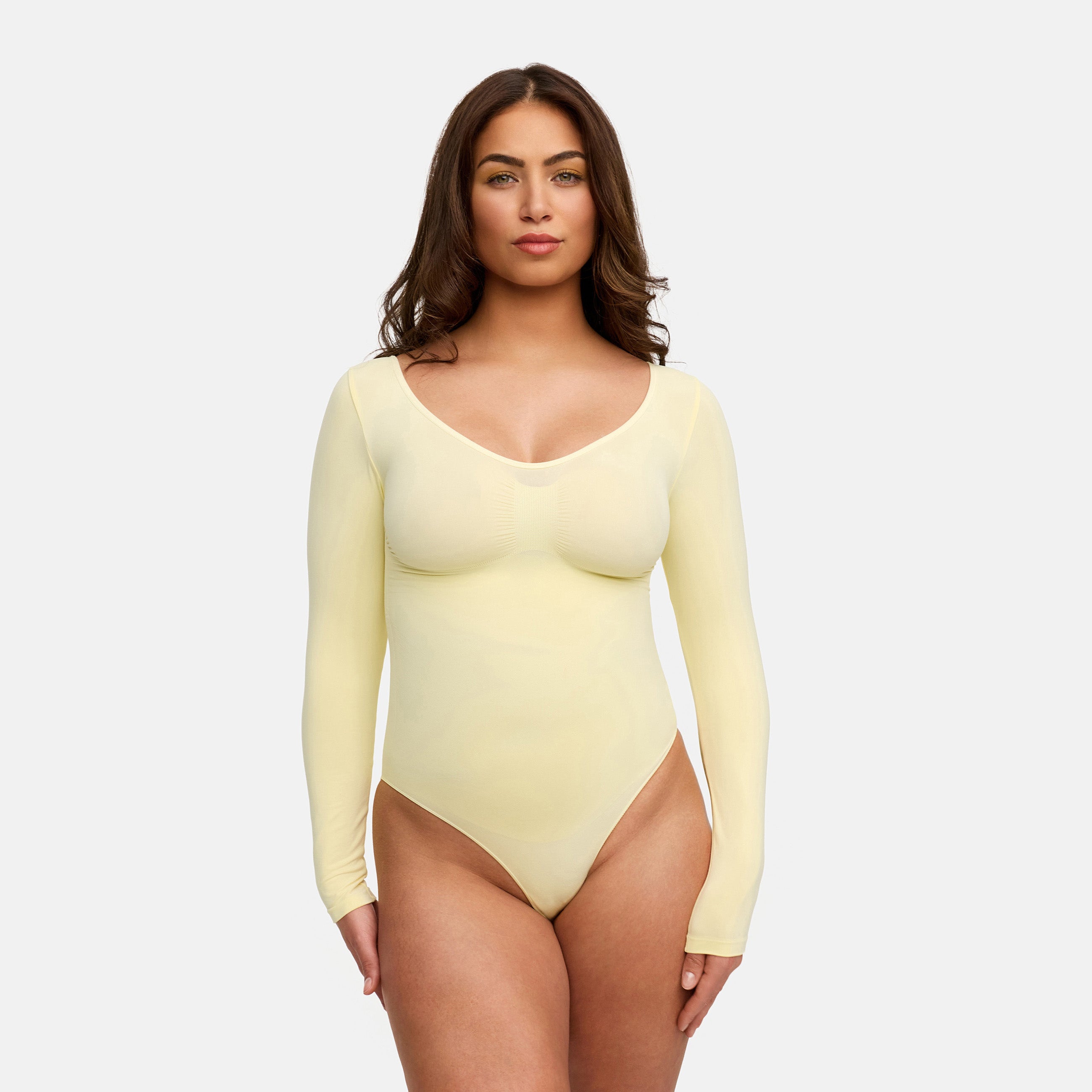 <tc>Body modellante a maniche lunghe con slip</tc>