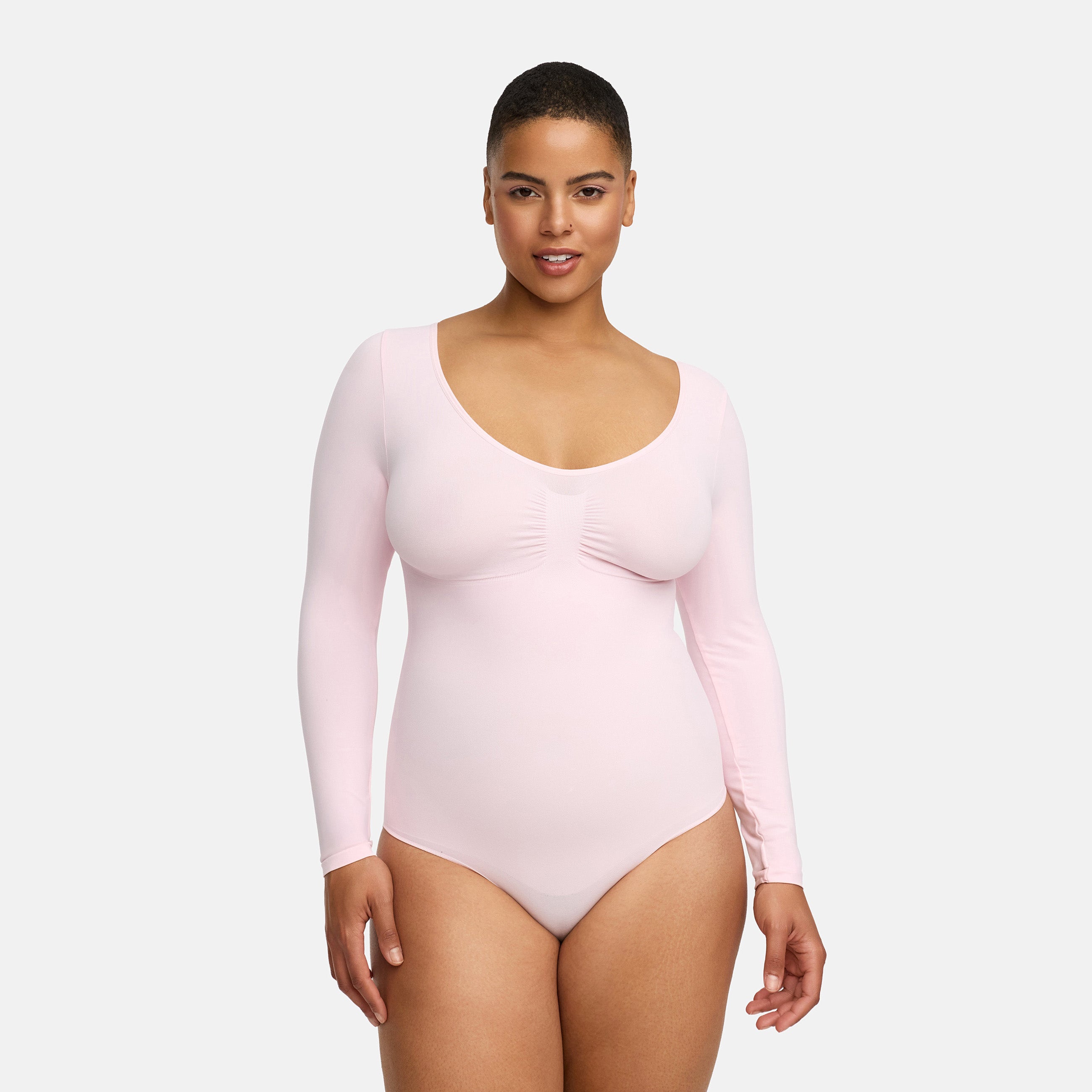 <tc>Body modellante a maniche lunghe con slip</tc>