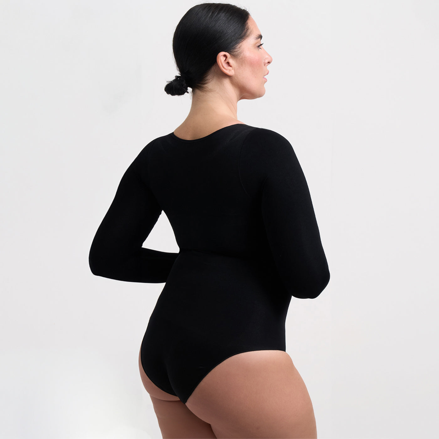 <tc>Body modellante a maniche lunghe con perizoma</tc>
