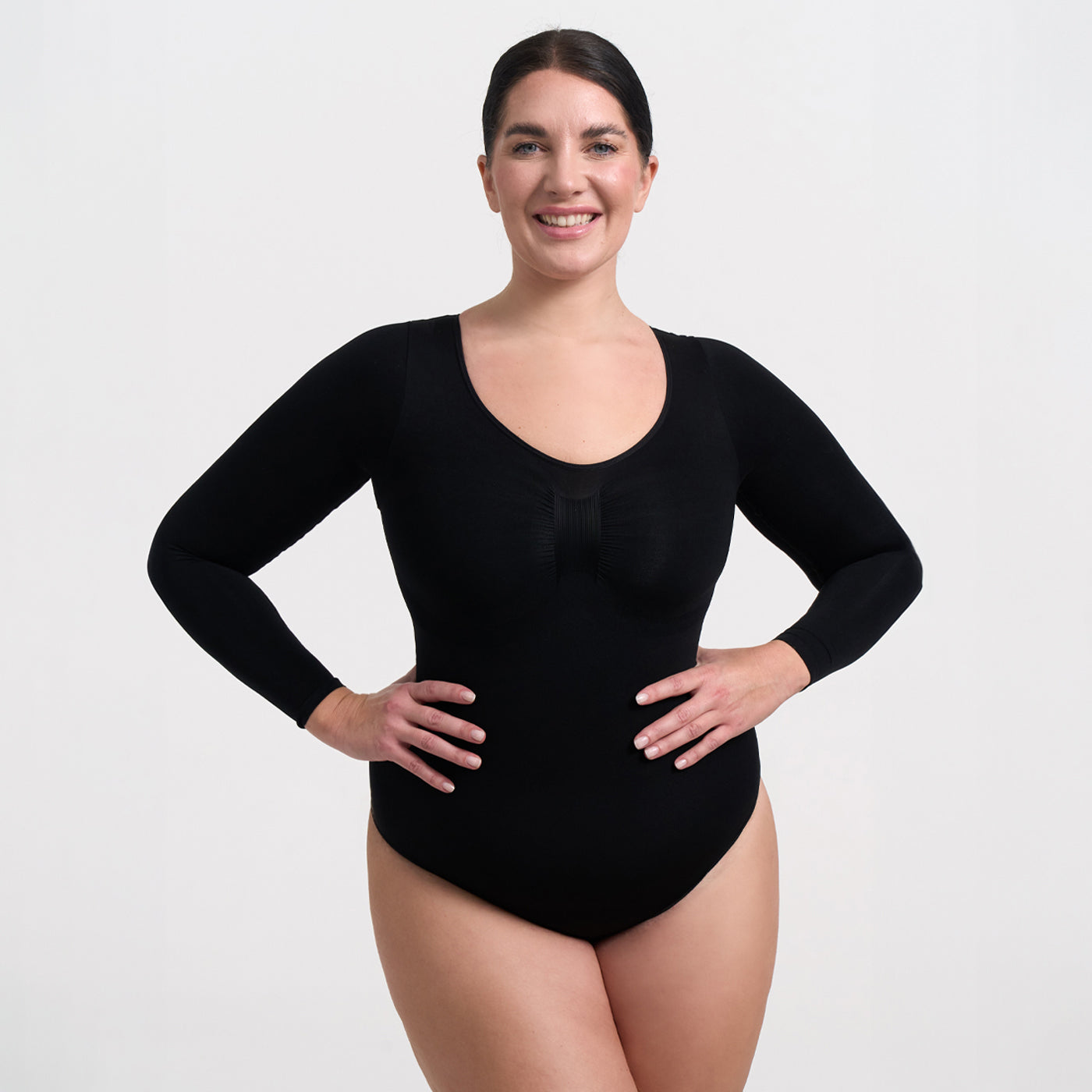 <tc>Body modellante a maniche lunghe con perizoma</tc>